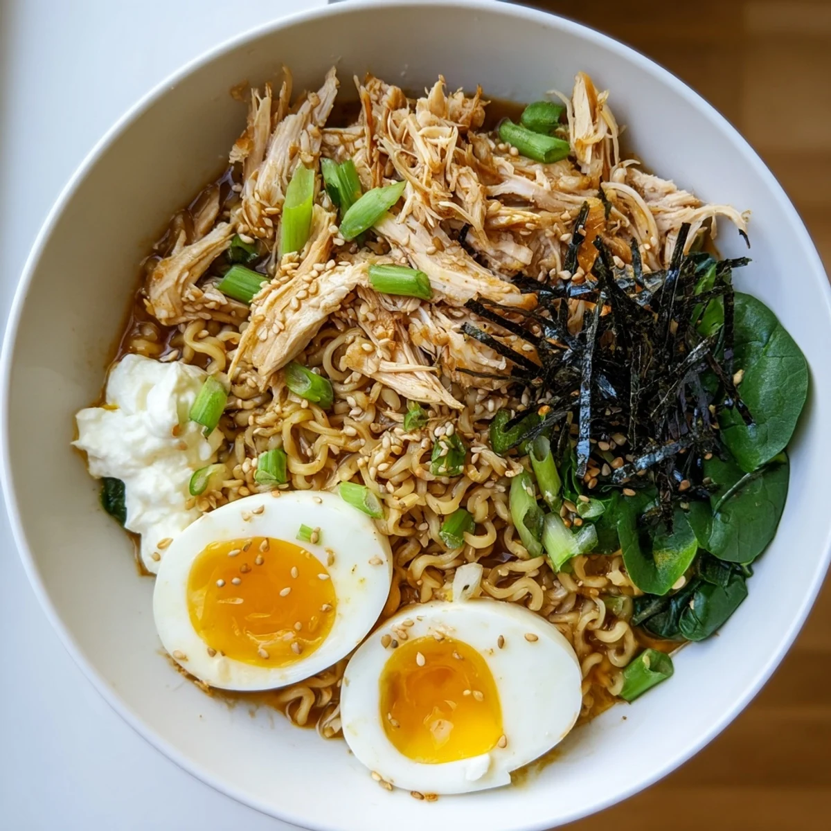 A close-up shot of rich and creamy Chicken Ramen with Kewpie Mayo, ready to be enjoyed as a meal.