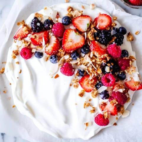 This image shows a beautifully arranged Berry Yogurt Bark, perfect for a refreshing, healthy snack.