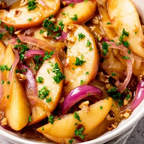 This warm Apple and Sauerkraut Skillet Salad is a tangy German-inspired side dish.  