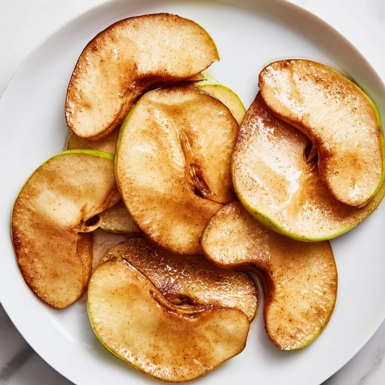 Fragrant and comforting, these Baked Apple Slices feature soft apples coated in cinnamon-brown sugar.