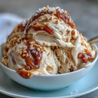 Velvety tahini ice cream with ribbons of Medjool dates, topped with a sprinkle of flaky sea salt for a rich Middle Eastern-inspired dessert.  